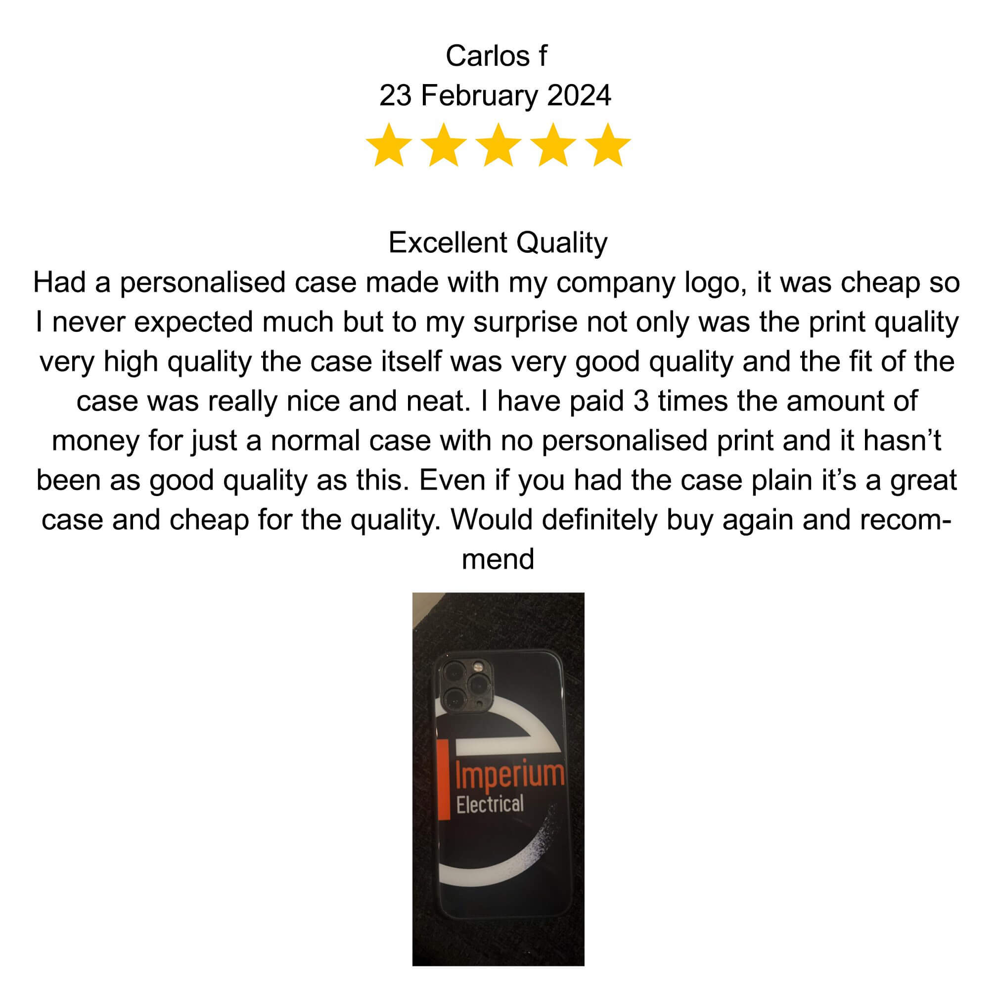 Close-up of a personalized red enamel ring with a heart design on a finger.