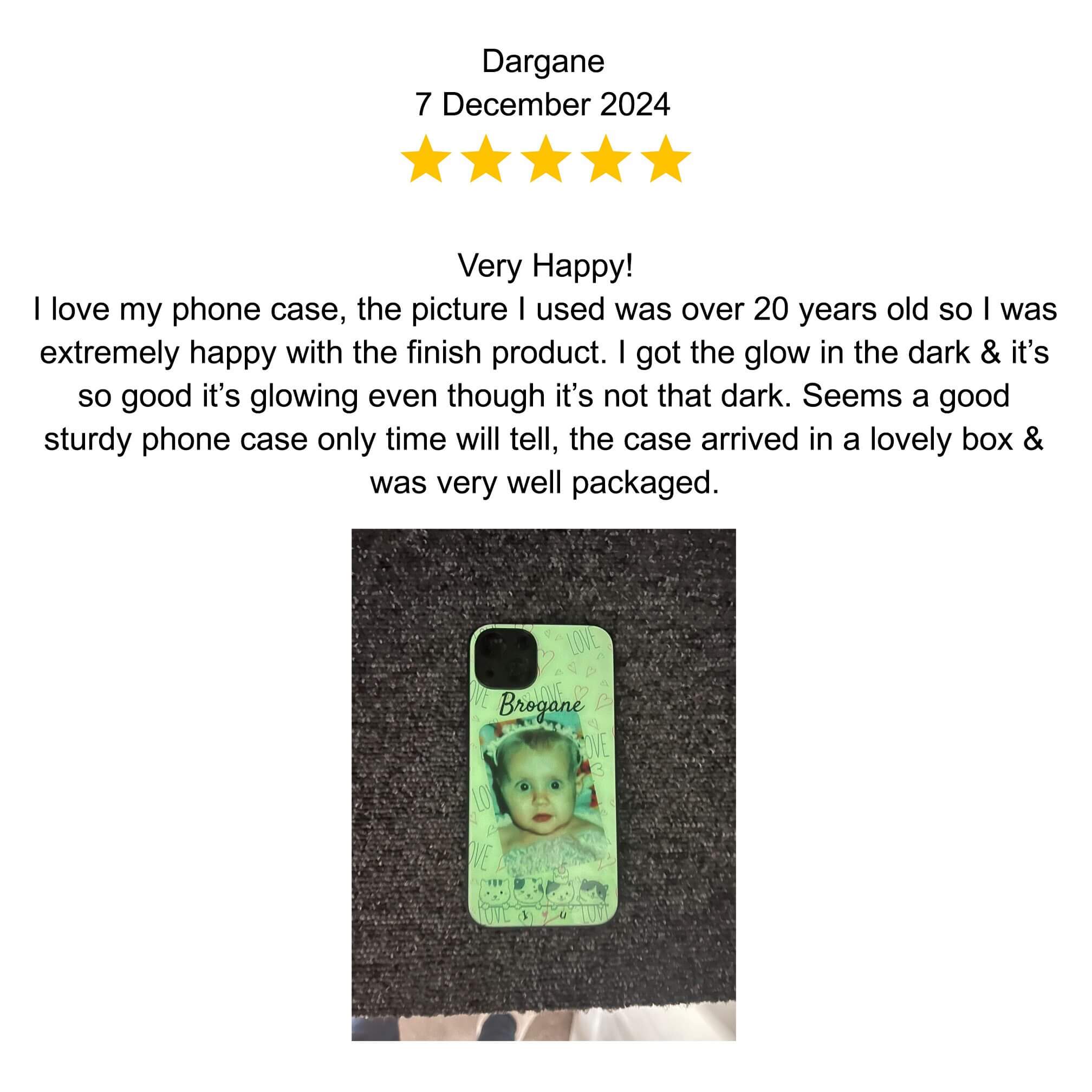 A green phone case featuring a character on a black surface.